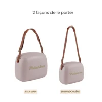 Deux façons de porter la Polarbox Perle : à la main ou en bandoulière