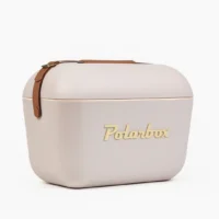 Vue latérale de la glacière Polarbox Perle avec sangle en cuir marron et logo doré