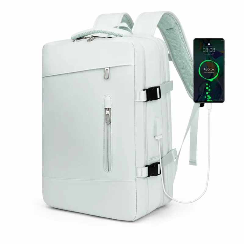 Sac à dos de voyage extensible vert clair avec port USB externe pour recharger un téléphone